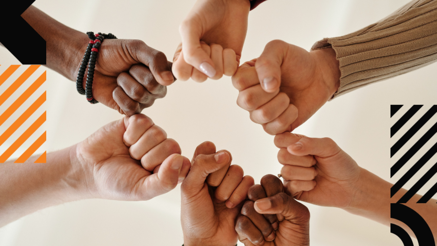 Fists coming together united in a circle