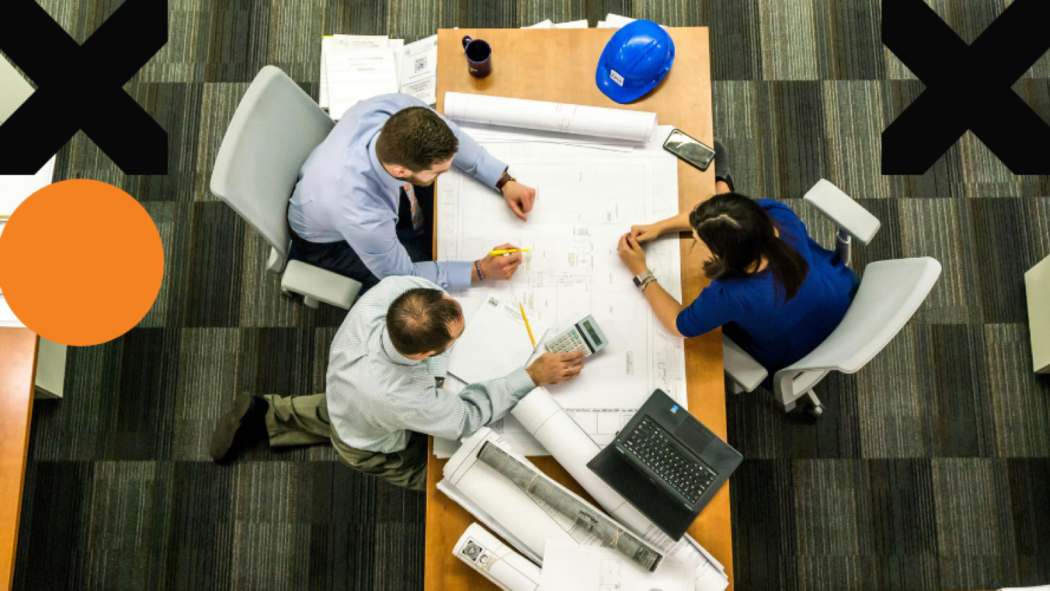 Coworkers collaborating at a desk